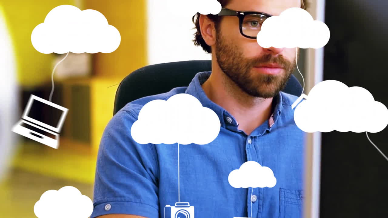 Animation of clouds with icons over caucasian businessman using computer