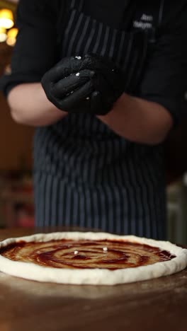 chef preparing pizza