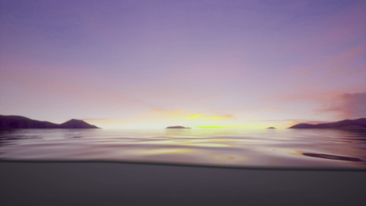 Calm water reflections during sunrise over distant islands
