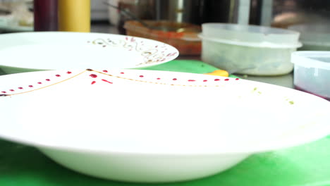 drawing and decorating food plates, close-up