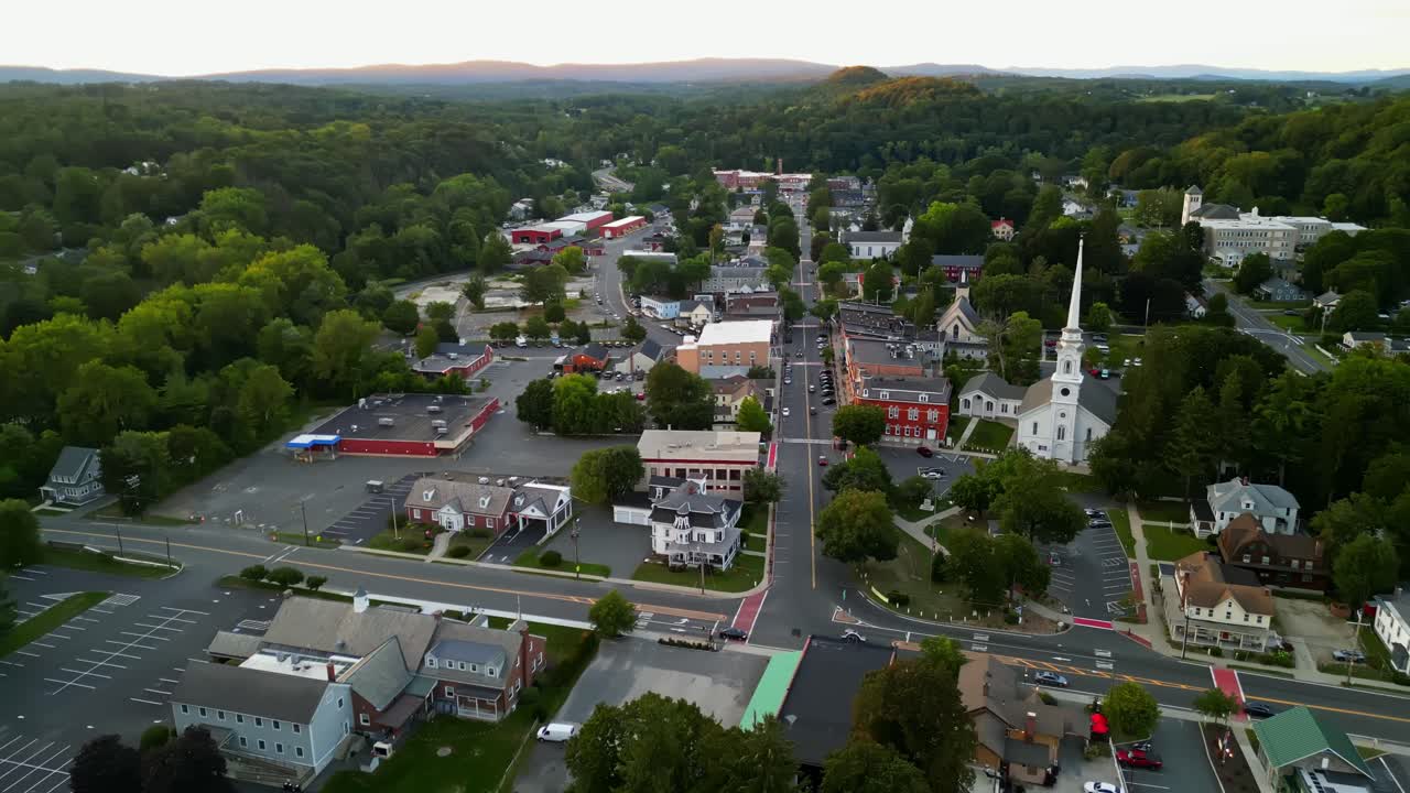 Amazing drone fly over charming Lee small American town with Lee Congregational Church and Main St., Berkshire, Massachusetts, USA