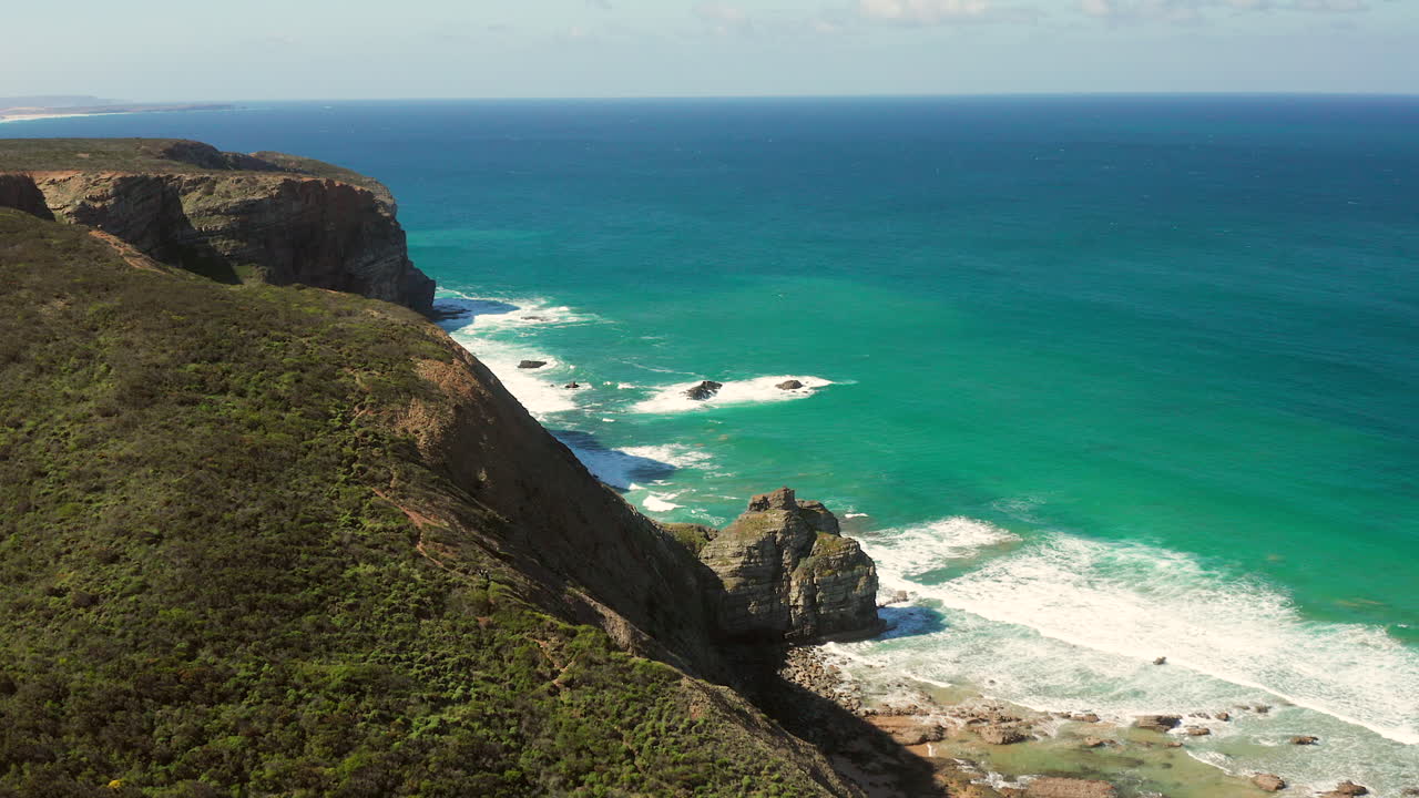 Aerial: The cliffs near the town of Arrifana in Portugal