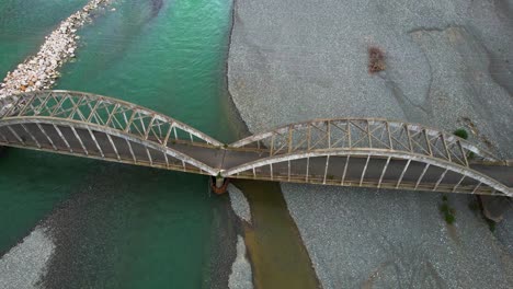 arches of king zog's historic bridge: a significant monument of the past century over the mat river flowing from the mountains