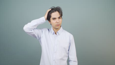 Man-looking-depressed-at-camera.