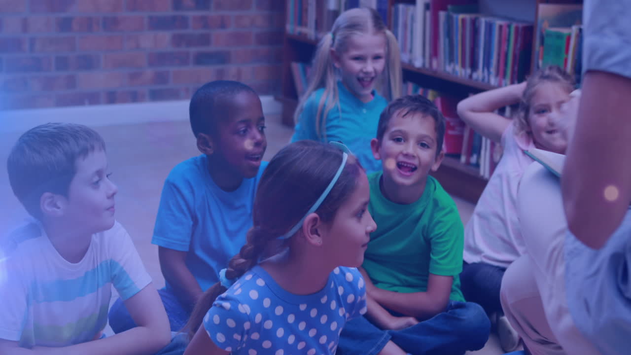 Animation of light spots over diverse schoolchildren and teacher reading books in library