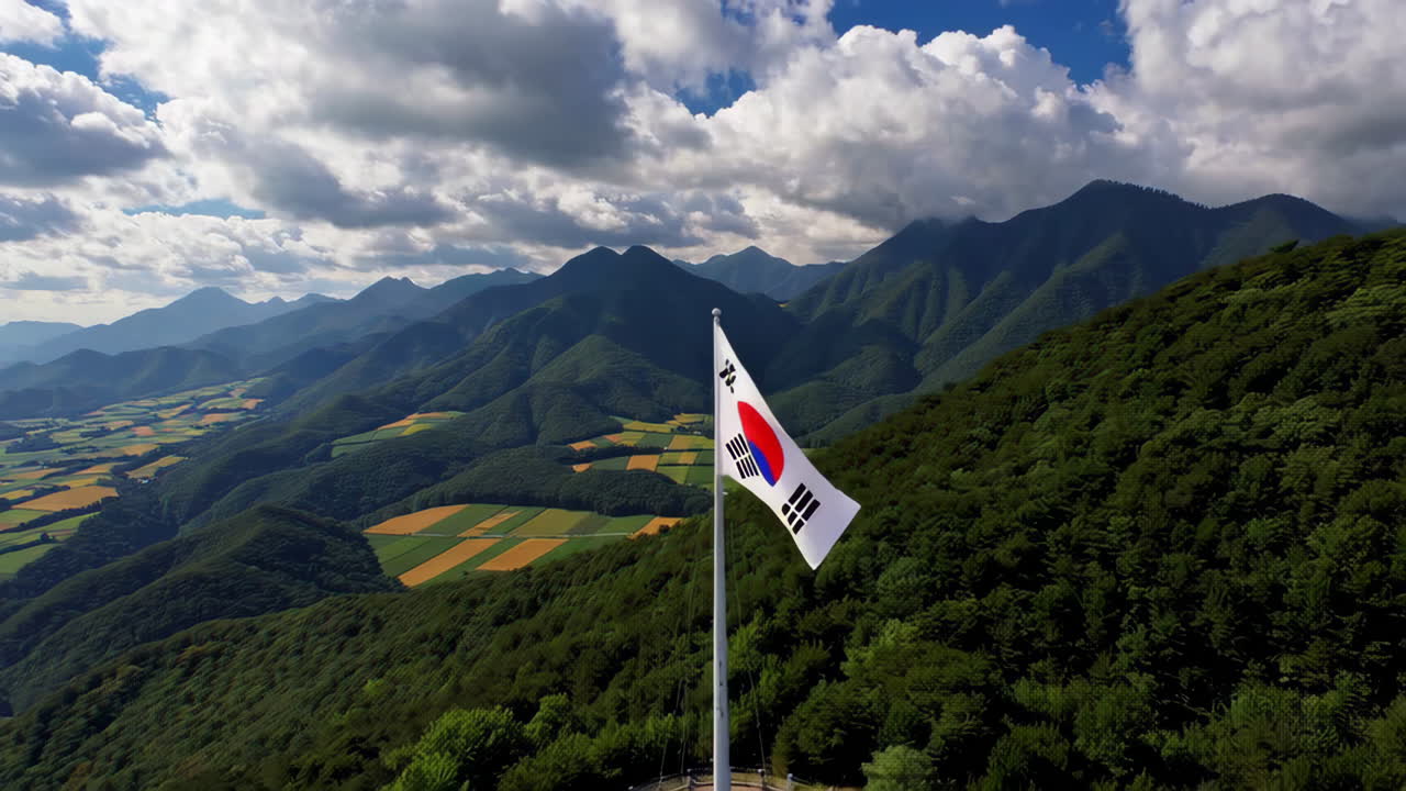 South Korean Flag on Mountaintop with Valley View