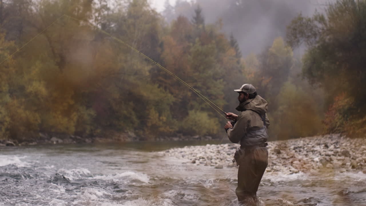 Fly Fishing in Autumnal Forest River