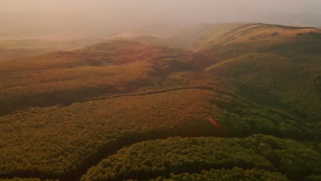 majella national park, abruzzo, italy - beautiful sunrise in a peaceful mountain landscape with lens flare. - aerial drone shot