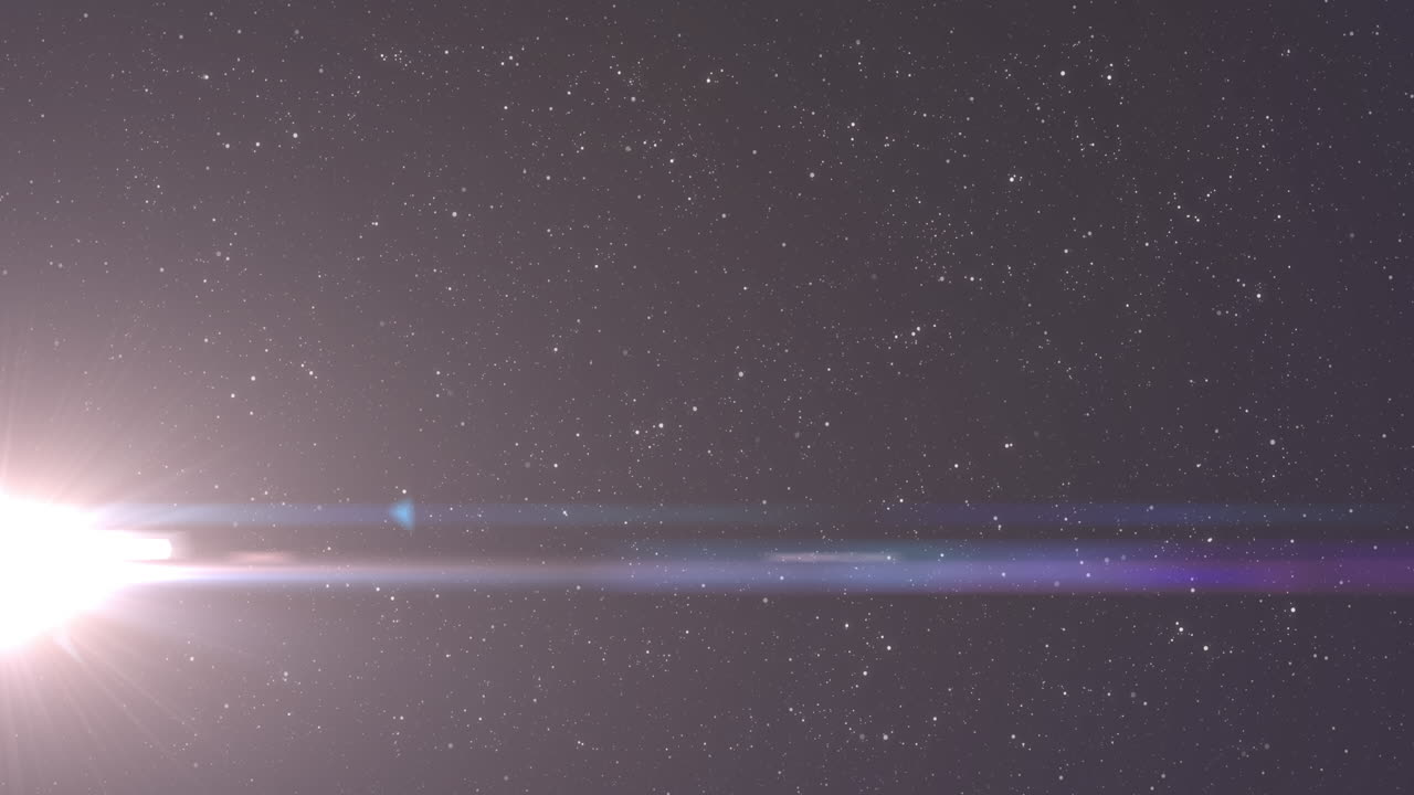 White spot of light glowing in the night sky