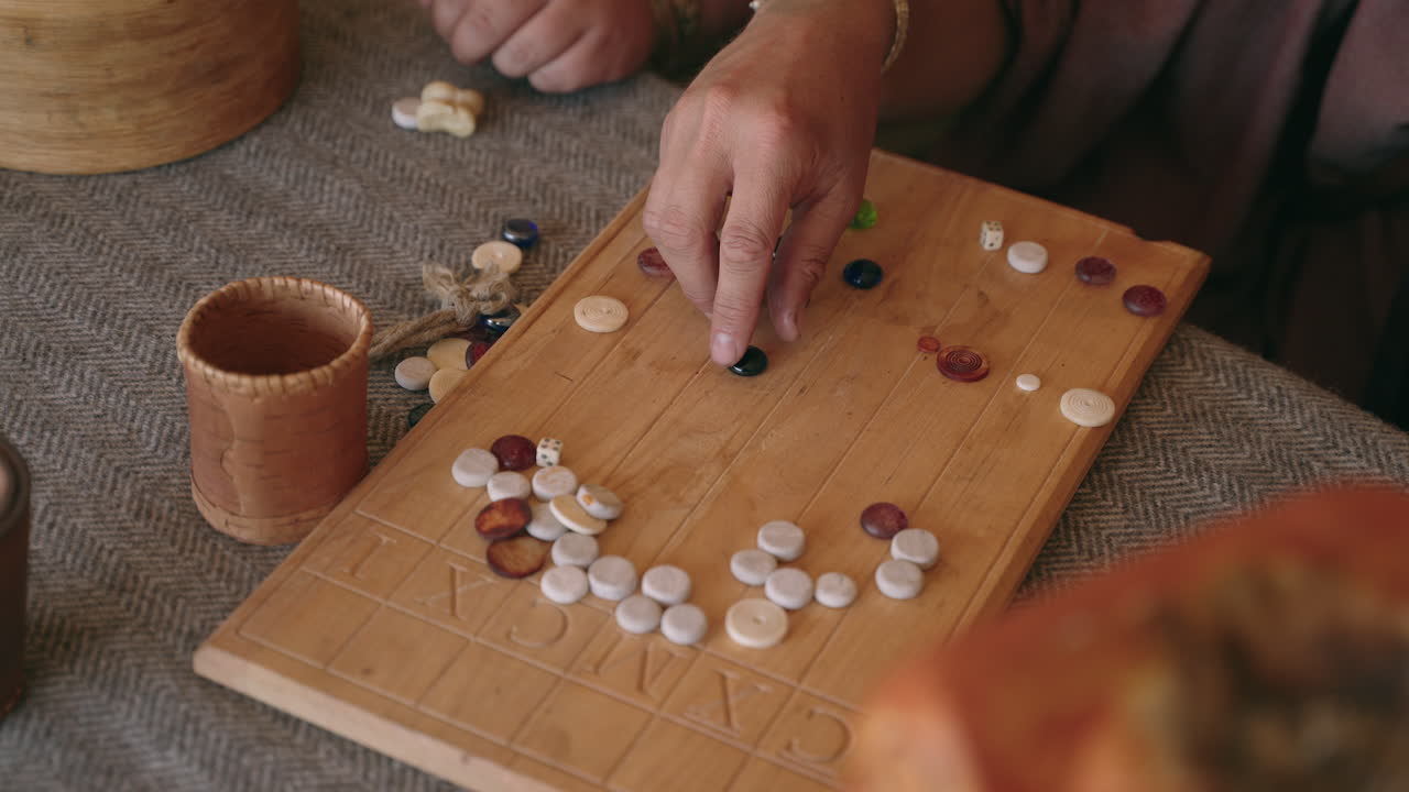 Person Playing a Historical Table Top Game