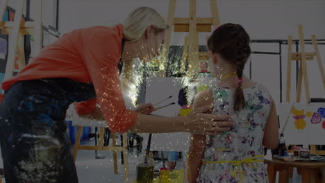 animation of glowing lights over girl and teacher painting