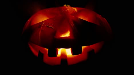 Scary-old-jack-o-lantern-on-black-background.