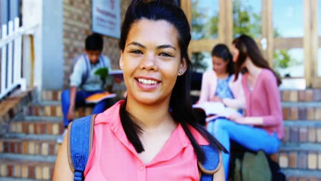 Portrait-of-smiling-schoolgirl