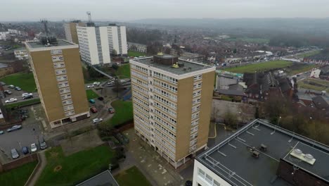 aerial footage view of high rise tower blocks, flats built in the city of stoke on trent to accommodate the increasing population, council housing crisis