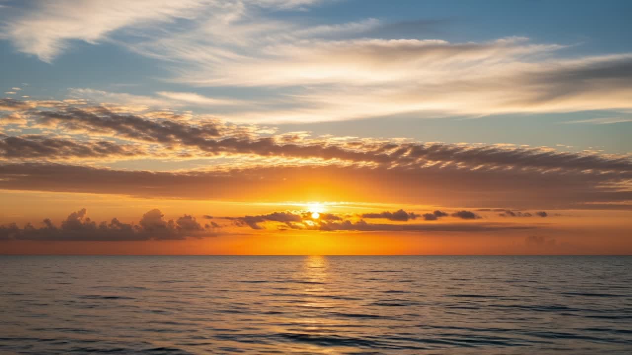 A Breathtaking Sunset Over Tranquil Waters: Capturing the Vibrant Colors and Peaceful Atmosphere of Dusk at the Ocean's Horizon