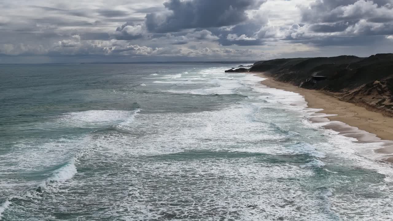 Drone captures dramatic waves and coastline under moody skies at Portsea, Melbourne, Victoria, Australia
