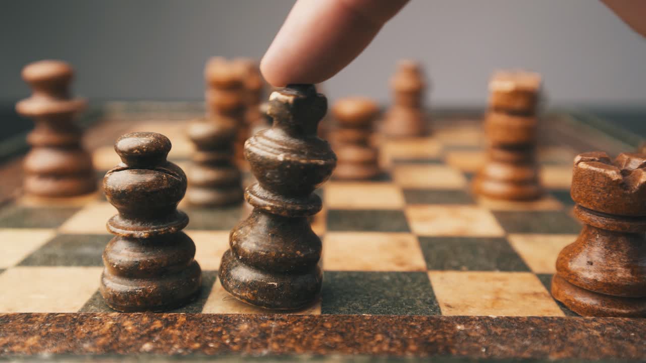 Chess checkmate close-up shot king falling