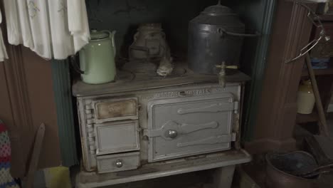 antique stove and vintage kitchen utensils