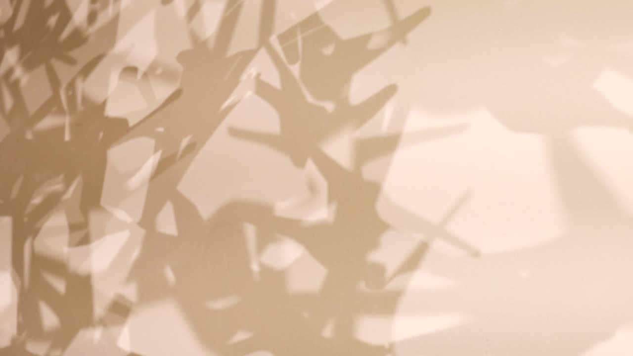 Abstract Shadows on a Light Beige Wall