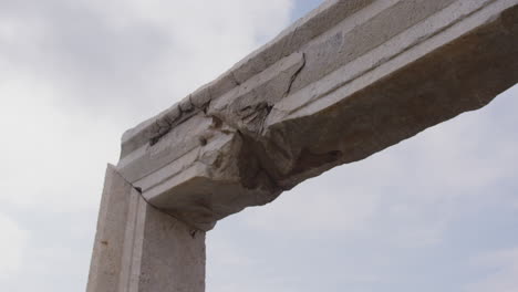 close up of ancient doorway with a crack in laodicea