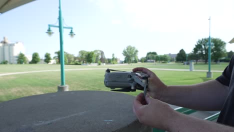 unfolding the wings of a drone in speed-ramp footage