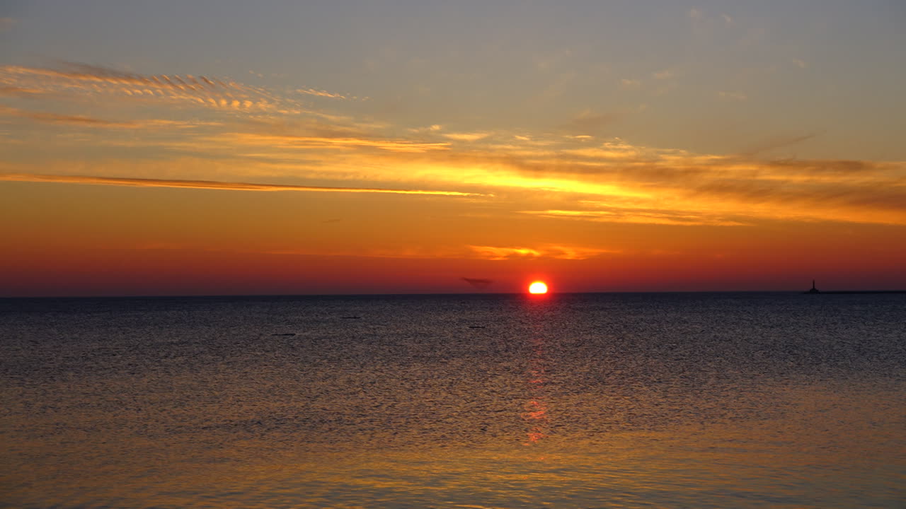 Sunset over the sea. Time Lapse