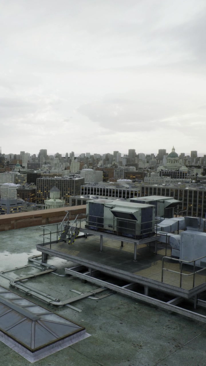 City skyline view with rooftops and buildings in cloudy weather