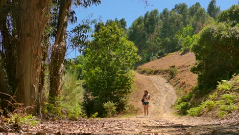 Young-woman-hiking-through-the-Portuguese-countryside