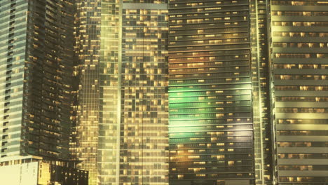 night architecture of skyscrapers with glass facade