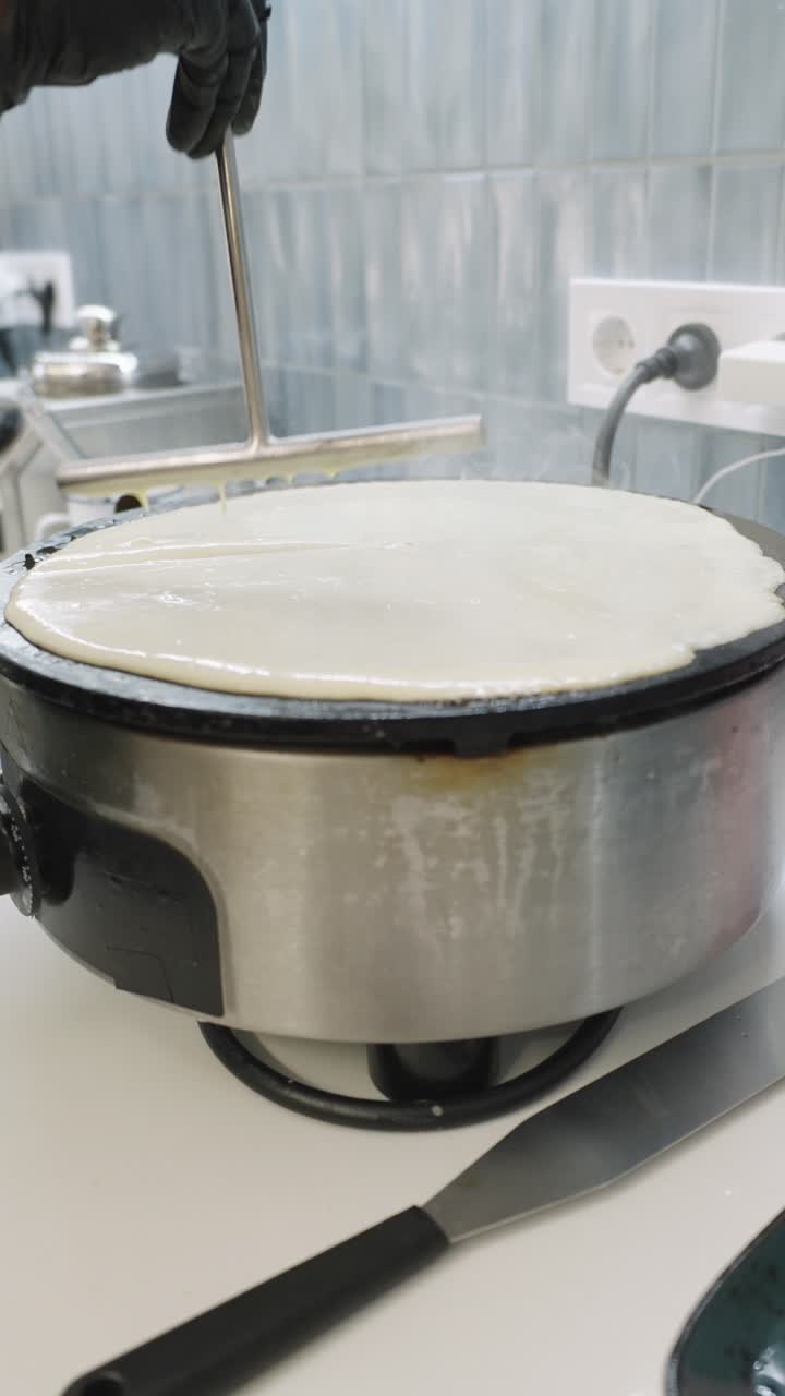 Making crepes in the kitchen