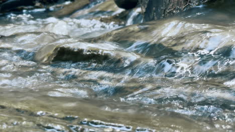 Creek-stone-landscape.-Stream-flowing-on-mountain-rock.-Transparent-water-flow.