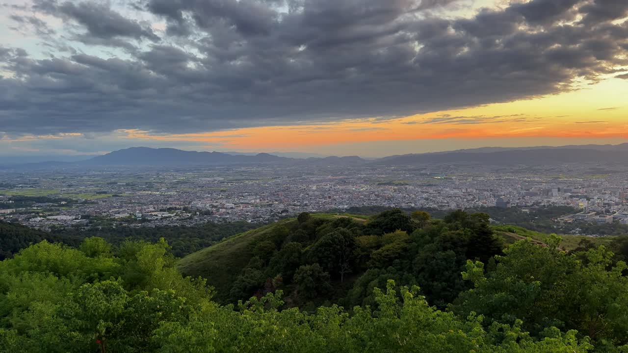 Scenic sunset view from Mount Wakakusa, Nara with lush green hills