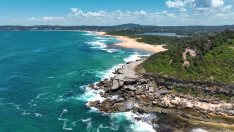 from terrigal to spoon bay: an aerial journey over wamberal beach, highlighting the central coast's pristine nature reserve, australia