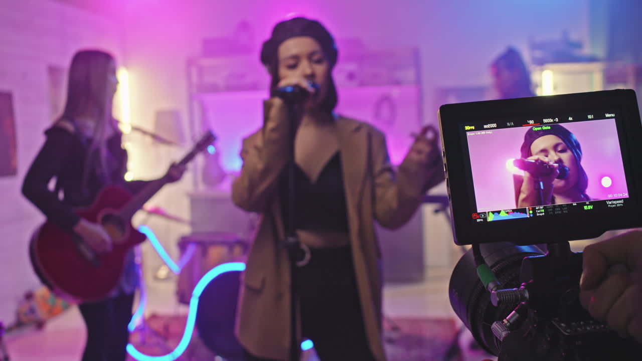 Female Rock Band Giving Concert At Night Club