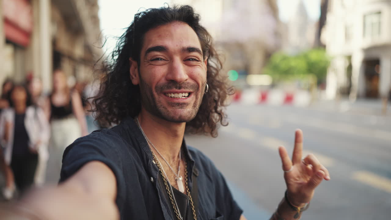 Man Taking a Selfie on the Street