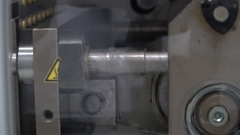 hydraulic pump in pharma lab presses plastic package and pills, static