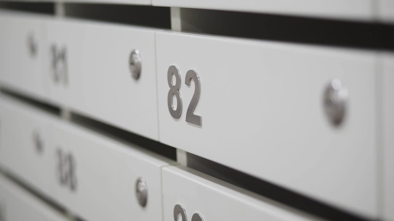 Close-up of Apartment Mailboxes with Number 82