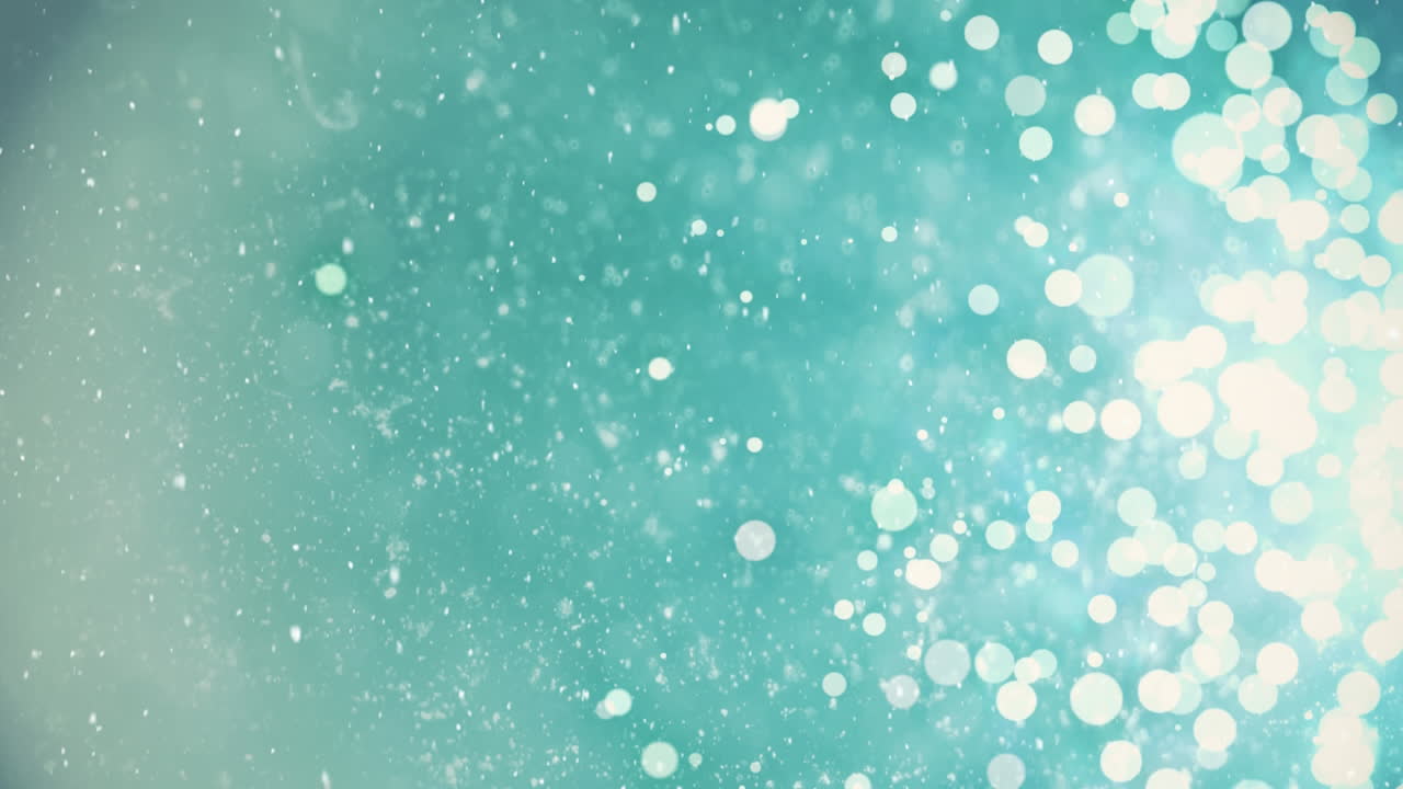 la nieve cayendo con chispas de luz navideña