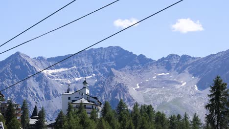 cable car moving through mountainous landscape