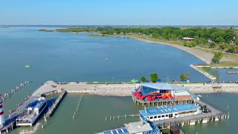 lake neusiedl, austria - a sight of the lake's harbor - aerial panning