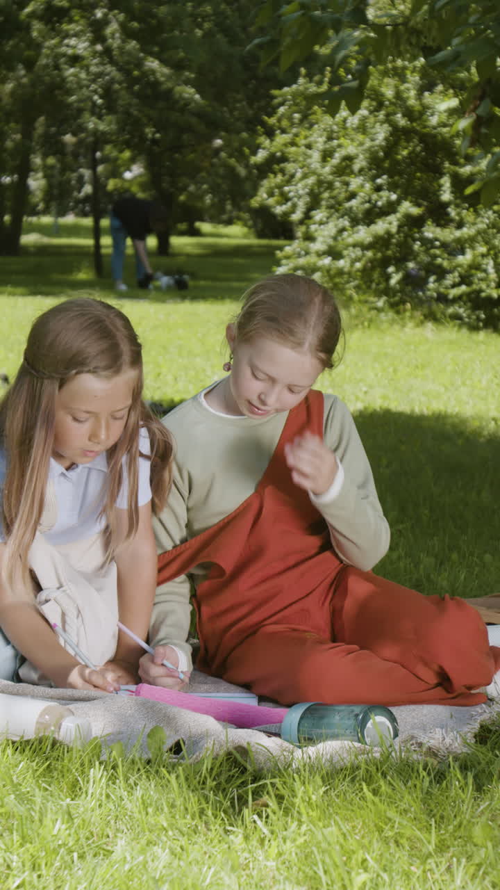 Happy Girls Enjoying a Sunny Day in the Park