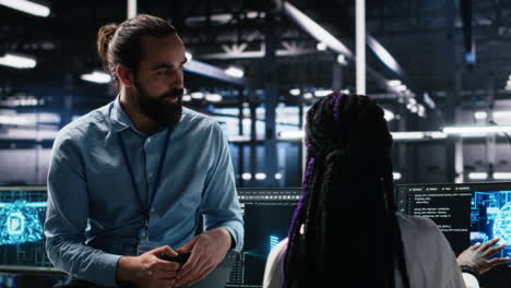 system administrator and employee in data center coding with generative ai