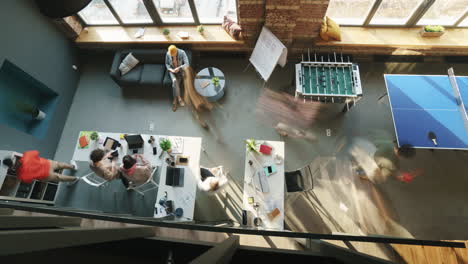busy modern office space top-down view