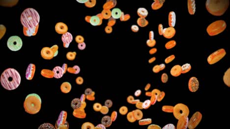 volando muchas rosquillas coloridas en fondo negro. pastel de rosquilla, dulces, postre. animación 3d de rosquillas girando. animación de bucle.