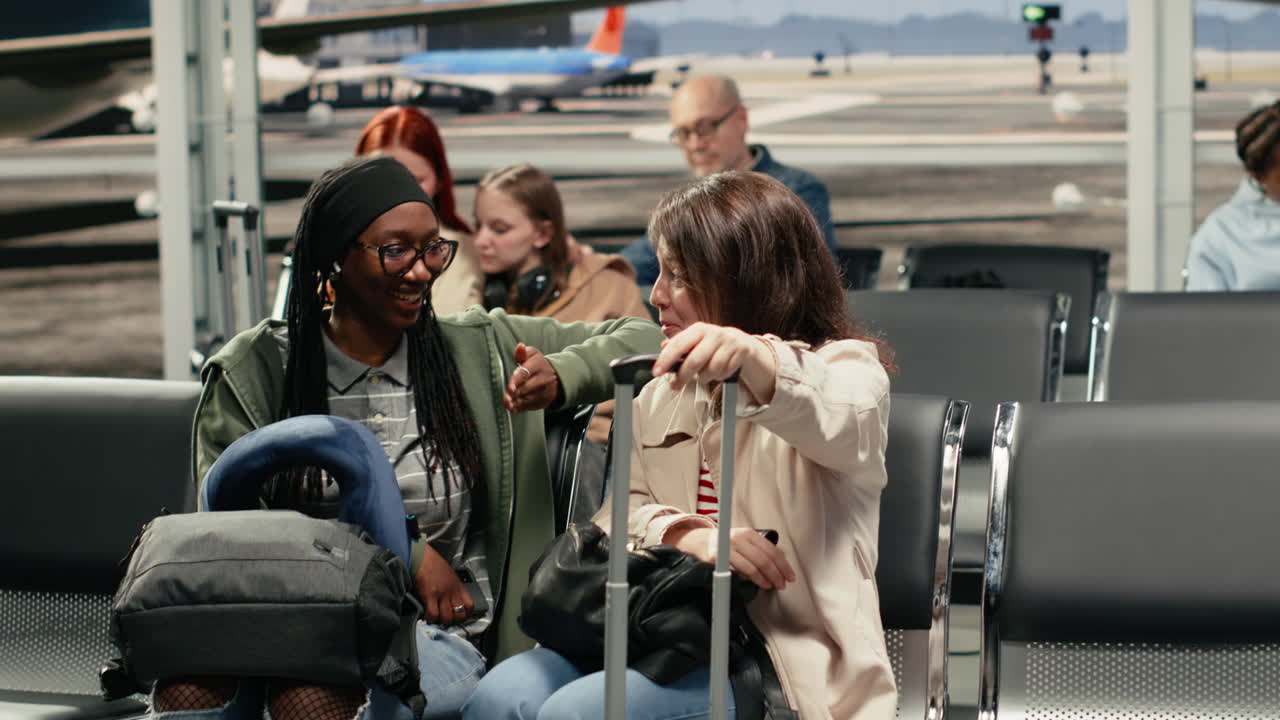 Smiling women in airport travelling to explore foreign country