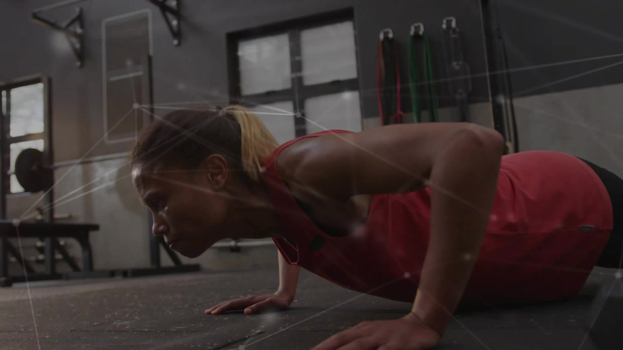 Woman starting plank and doing pushups on rubber floor, net overlay tracing arms building fitness