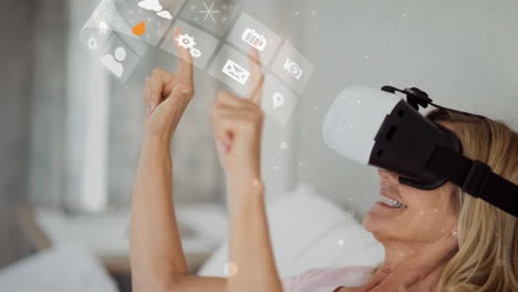usando auriculares de realidad virtual, mujer interactuando con iconos digitales sobre sus manos