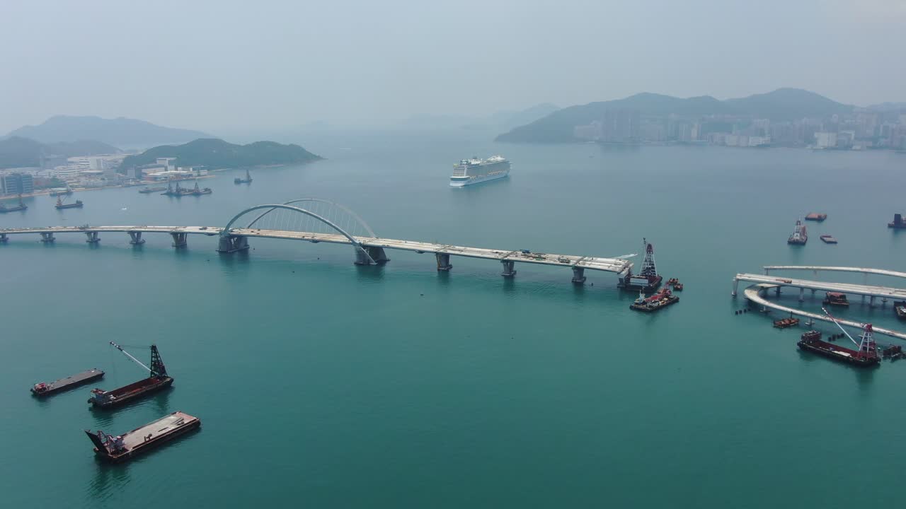 proyecto de construcción del enlace cruzado de la bahía de hong kong, un puente doble de dos carriles que conecta el túnel tseung kwan o lam tin con la carretera wan po, vista aérea