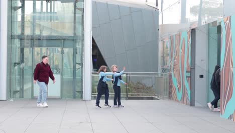 children and adults entering the museum together