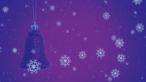 animation of snow falling over christmas bell decoration and winter scenery